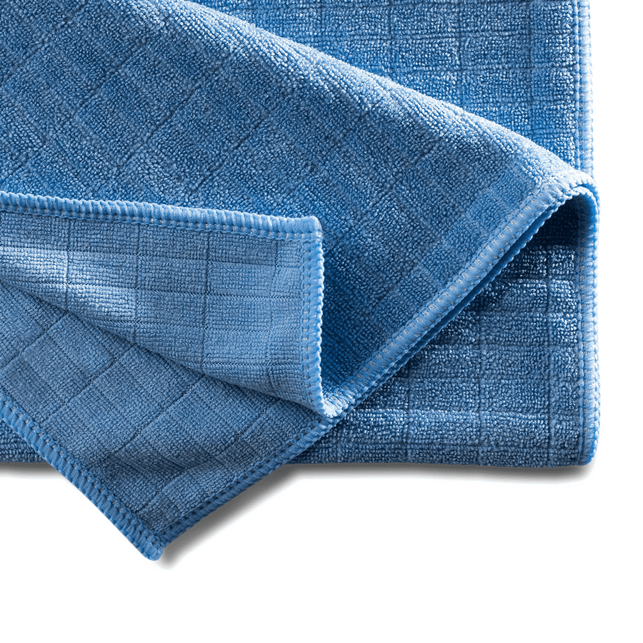 Blaues Mikrofasertuch mit Waffelstruktur und umgenähtem Rand, gefaltet, für professionelle Reinigung Blaues Mikrofasertuch mit Waffelstruktur und umgenähtem Rand, gefaltet, für professionelle Reinigung