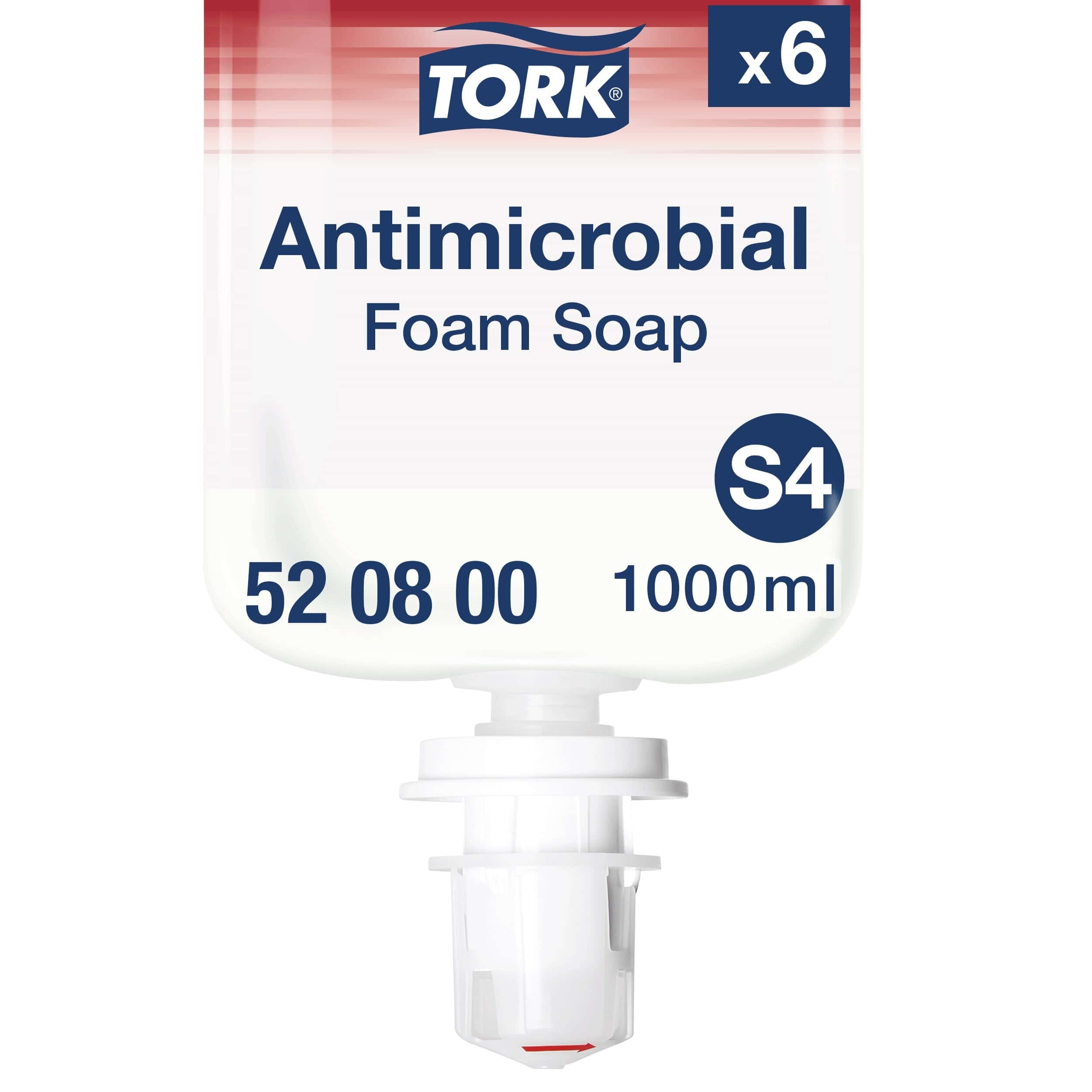 Tork Antimikrobielle Schaumseife S4 Nachfüllpackung Nachfüllpackung mit antimikrobieller Schaumseife von Tork mit sichtbarem Etikett und Spender.