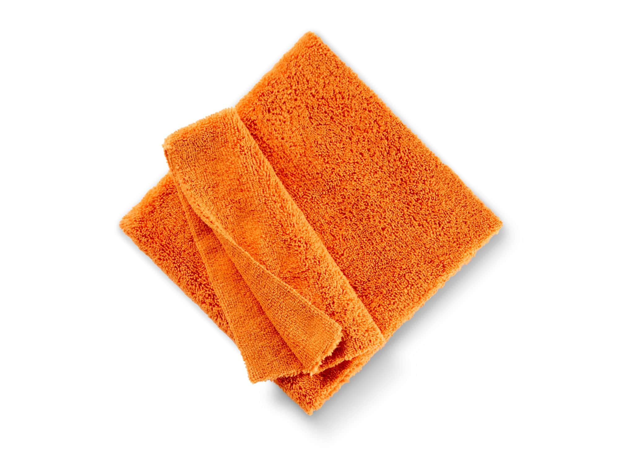 Orangefarbenes Mikrofaser-Reinigungstuch, gefaltet auf weißem Hintergrund, ideal für die streifenfreie Reinigung im gewerblichen Bereich. Orangefarbenes Mikrofaser-Reinigungstuch, gefaltet auf weißem Hintergrund, ideal für die streifenfreie Reinigung im gewerblichen Bereich.
