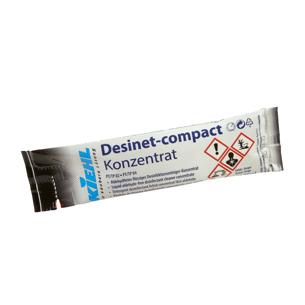 Kiehl Desinet-compact Desinfektionsreiniger-Konzentrat Kiehl Desinet-Kompakt-Desinfektionsreiniger-Konzentrat-Verpackung mit Gefahrensymbolen.
